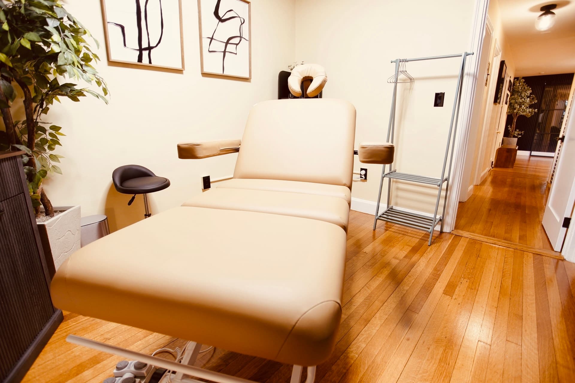Massage therapy room at Forever Young Spa, Back Bay Boston — soft lighting and quiet treatment space